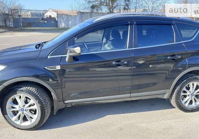 Черный Форд Куга, объемом двигателя 2.52 л и пробегом 220 тыс. км за 9750 $, фото 2 на Automoto.ua