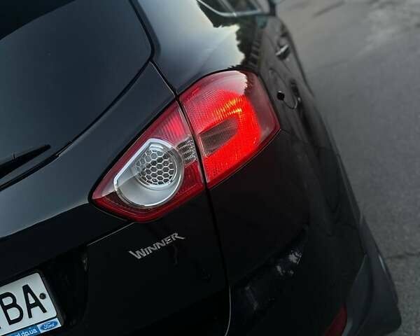 Черный Форд Куга, объемом двигателя 2 л и пробегом 215 тыс. км за 10450 $, фото 20 на Automoto.ua