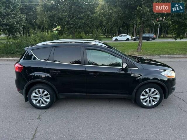 Черный Форд Куга, объемом двигателя 2 л и пробегом 215 тыс. км за 10450 $, фото 26 на Automoto.ua