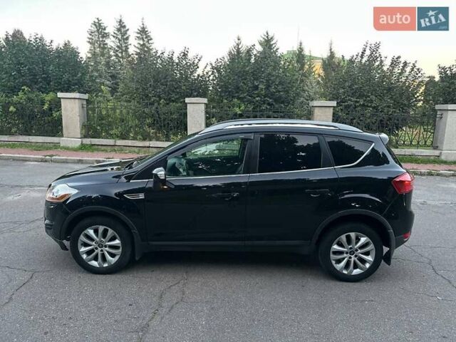 Черный Форд Куга, объемом двигателя 2 л и пробегом 215 тыс. км за 10450 $, фото 1 на Automoto.ua