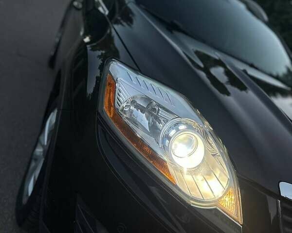 Черный Форд Куга, объемом двигателя 2 л и пробегом 215 тыс. км за 10450 $, фото 22 на Automoto.ua