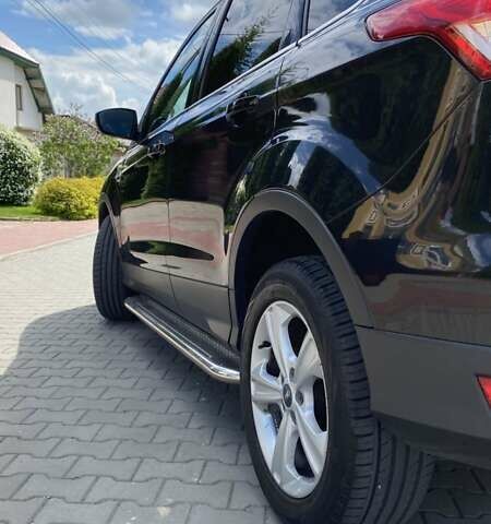 Чорний Форд Куга, об'ємом двигуна 2 л та пробігом 198 тис. км за 12699 $, фото 1 на Automoto.ua