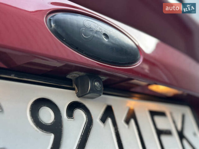 Красный Форд Куга, объемом двигателя 2 л и пробегом 169 тыс. км за 13555 $, фото 98 на Automoto.ua