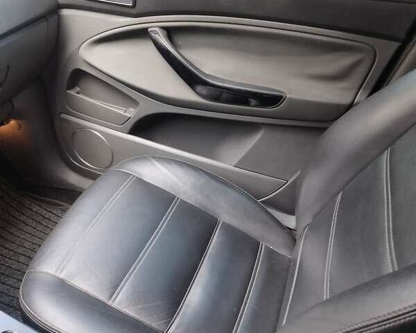 Сірий Форд Куга, об'ємом двигуна 2 л та пробігом 239 тис. км за 11800 $, фото 2 на Automoto.ua