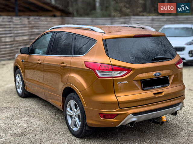 Помаранчевий Форд Куга, об'ємом двигуна 2 л та пробігом 249 тис. км за 14950 $, фото 2 на Automoto.ua