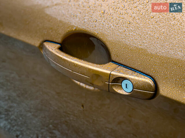 Помаранчевий Форд Куга, об'ємом двигуна 2 л та пробігом 249 тис. км за 14950 $, фото 59 на Automoto.ua