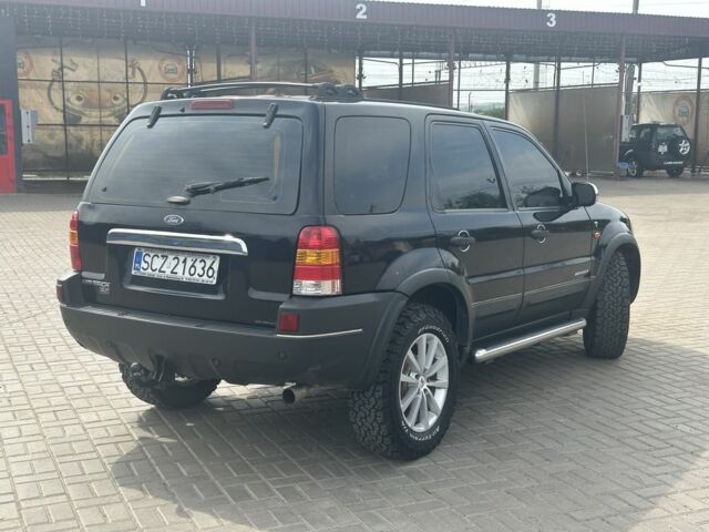 Черный Форд Маверик, объемом двигателя 3 л и пробегом 300 тыс. км за 4050 $, фото 3 на Automoto.ua