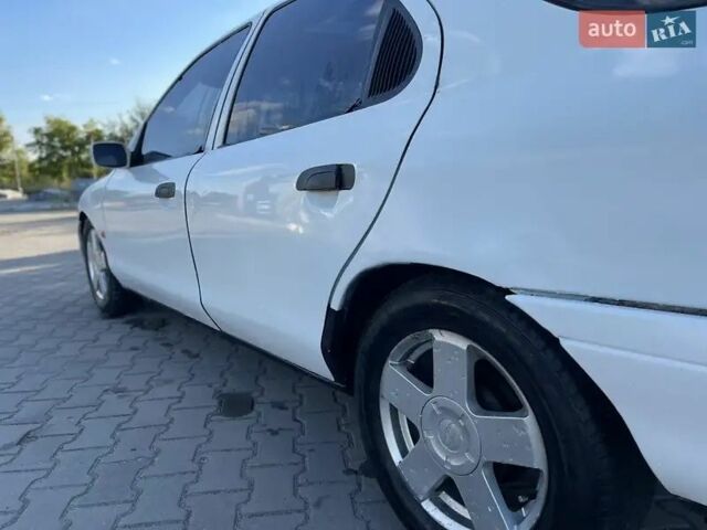 Белый Форд Мондео, объемом двигателя 1.8 л и пробегом 253 тыс. км за 1000 $, фото 6 на Automoto.ua