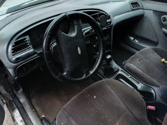 Білий Форд Мондео, об'ємом двигуна 2 л та пробігом 350 тис. км за 946 $, фото 4 на Automoto.ua