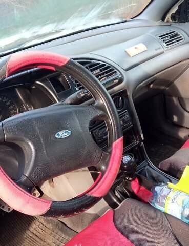 Белый Форд Мондео, объемом двигателя 1.6 л и пробегом 174 тыс. км за 1750 $, фото 5 на Automoto.ua