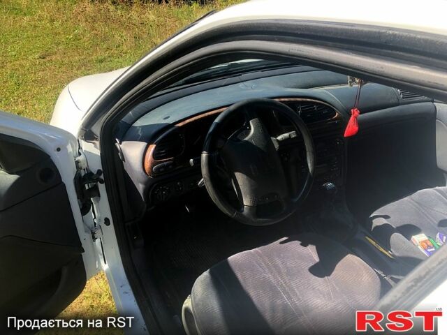 Білий Форд Мондео, об'ємом двигуна 2.5 л та пробігом 223 тис. км за 1800 $, фото 3 на Automoto.ua