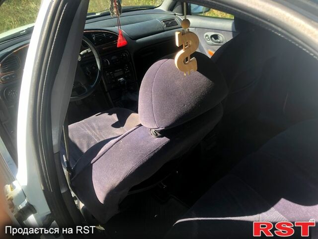 Білий Форд Мондео, об'ємом двигуна 2.5 л та пробігом 223 тис. км за 1800 $, фото 4 на Automoto.ua