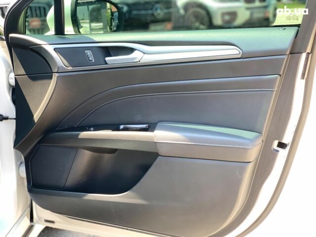 Белый Форд Мондео, объемом двигателя 2 л и пробегом 81 тыс. км за 14890 $, фото 24 на Automoto.ua