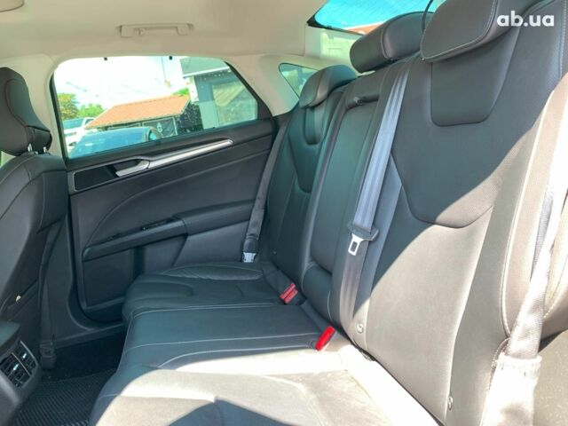 Белый Форд Мондео, объемом двигателя 2 л и пробегом 81 тыс. км за 14890 $, фото 29 на Automoto.ua