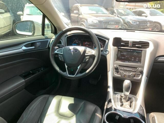 Белый Форд Мондео, объемом двигателя 2 л и пробегом 81 тыс. км за 14890 $, фото 30 на Automoto.ua