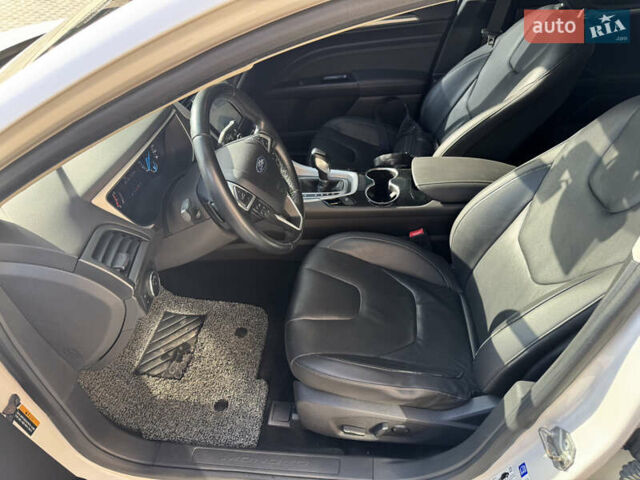 Белый Форд Мондео, объемом двигателя 2 л и пробегом 164 тыс. км за 14900 $, фото 17 на Automoto.ua