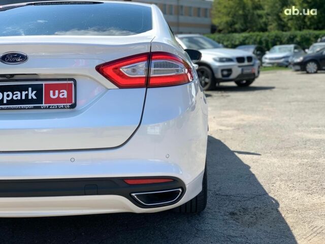 Белый Форд Мондео, объемом двигателя 2 л и пробегом 81 тыс. км за 14890 $, фото 12 на Automoto.ua
