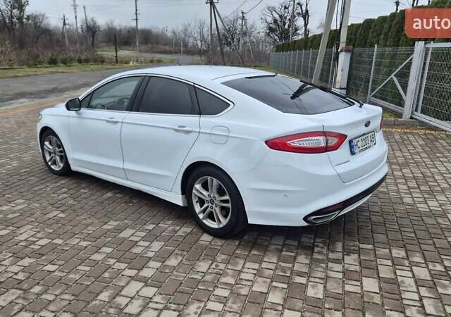 Белый Форд Мондео, объемом двигателя 2 л и пробегом 297 тыс. км за 9750 $, фото 21 на Automoto.ua