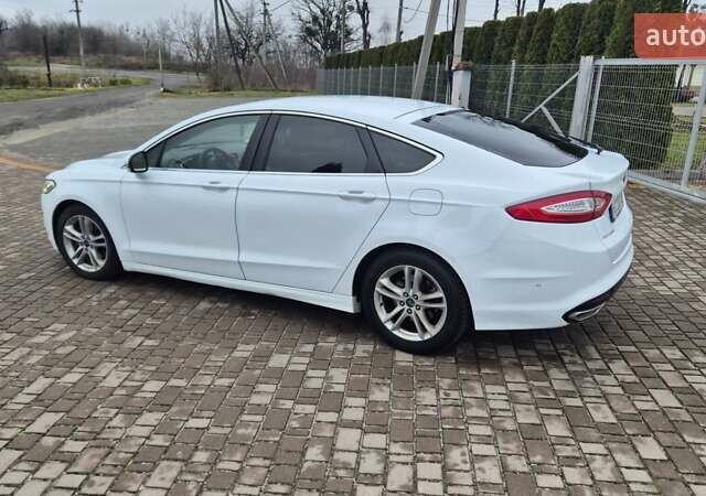 Белый Форд Мондео, объемом двигателя 2 л и пробегом 297 тыс. км за 9750 $, фото 25 на Automoto.ua