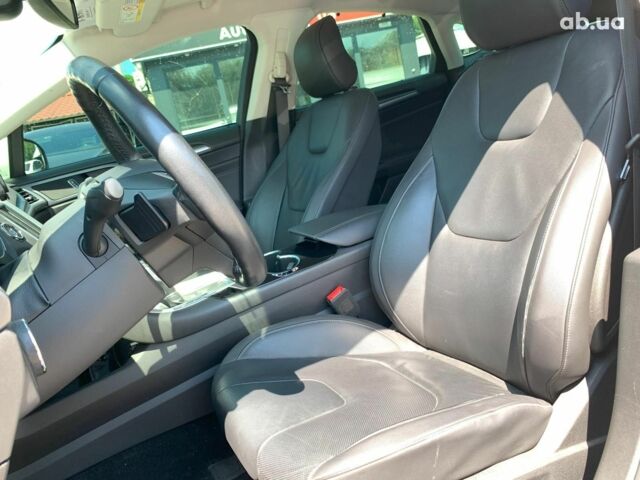 Белый Форд Мондео, объемом двигателя 2 л и пробегом 81 тыс. км за 14890 $, фото 33 на Automoto.ua