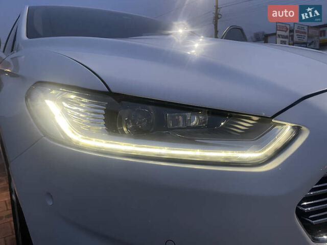 Білий Форд Мондео, об'ємом двигуна 2 л та пробігом 134 тис. км за 10200 $, фото 27 на Automoto.ua