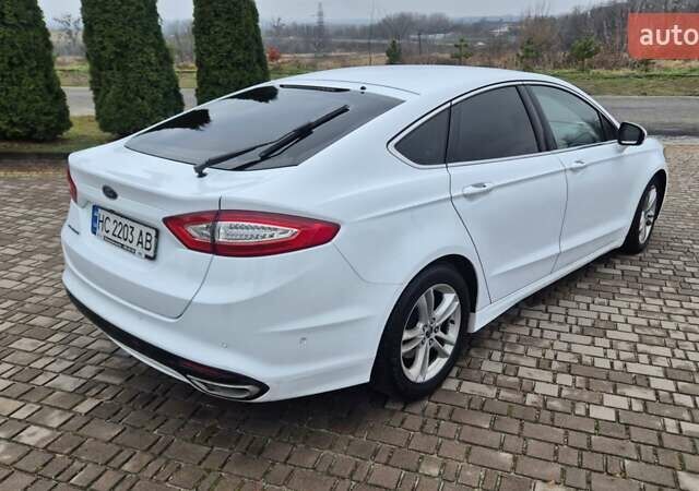 Белый Форд Мондео, объемом двигателя 2 л и пробегом 297 тыс. км за 9750 $, фото 27 на Automoto.ua