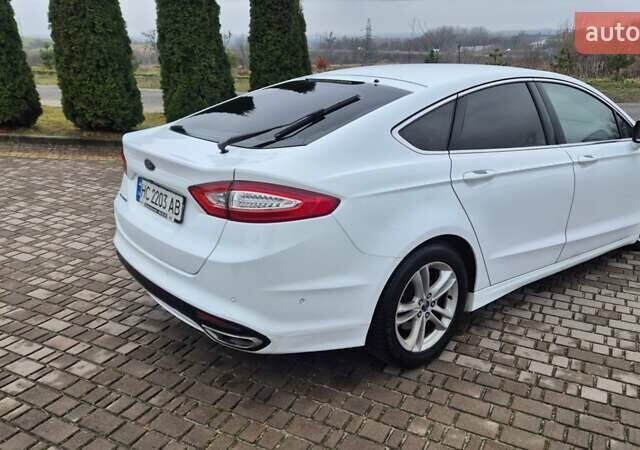 Белый Форд Мондео, объемом двигателя 2 л и пробегом 297 тыс. км за 9750 $, фото 4 на Automoto.ua