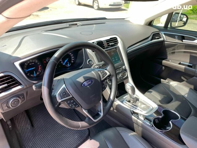 Белый Форд Мондео, объемом двигателя 2 л и пробегом 81 тыс. км за 14890 $, фото 32 на Automoto.ua