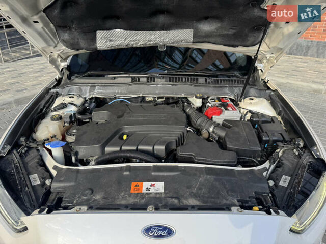 Белый Форд Мондео, объемом двигателя 2 л и пробегом 164 тыс. км за 14900 $, фото 42 на Automoto.ua