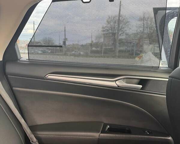 Білий Форд Мондео, об'ємом двигуна 2 л та пробігом 203 тис. км за 10300 $, фото 5 на Automoto.ua