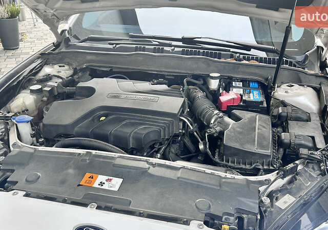 Белый Форд Мондео, объемом двигателя 2 л и пробегом 112 тыс. км за 13500 $, фото 27 на Automoto.ua