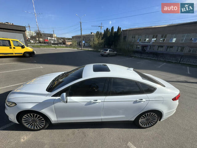 Білий Форд Мондео, об'ємом двигуна 2 л та пробігом 77 тис. км за 17999 $, фото 11 на Automoto.ua