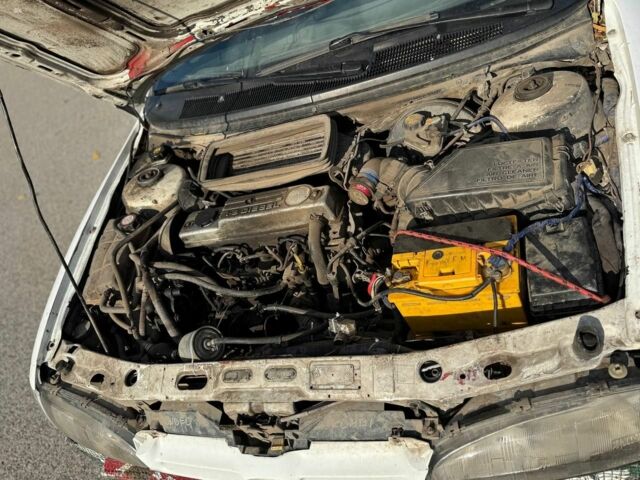 Белый Форд Мондео, объемом двигателя 1.8 л и пробегом 66 тыс. км за 355 $, фото 7 на Automoto.ua