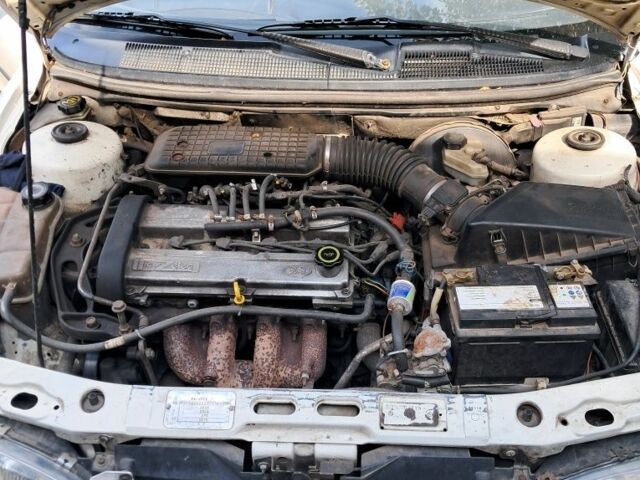 Белый Форд Мондео, объемом двигателя 1.8 л и пробегом 20 тыс. км за 1500 $, фото 4 на Automoto.ua