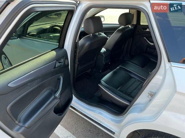 Белый Форд Мондео, объемом двигателя 2 л и пробегом 400 тыс. км за 8900 $, фото 12 на Automoto.ua