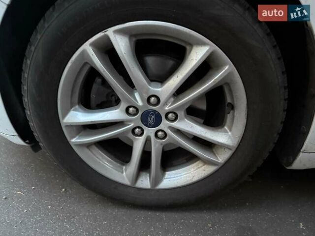 Білий Форд Мондео, об'ємом двигуна 2 л та пробігом 215 тис. км за 11000 $, фото 12 на Automoto.ua