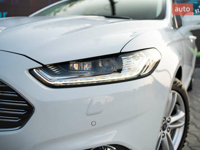 Белый Форд Мондео, объемом двигателя 2 л и пробегом 227 тыс. км за 14500 $, фото 2 на Automoto.ua