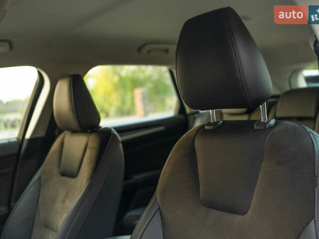 Белый Форд Мондео, объемом двигателя 2 л и пробегом 227 тыс. км за 14500 $, фото 79 на Automoto.ua