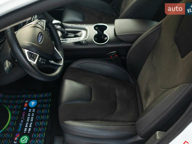 Белый Форд Мондео, объемом двигателя 2 л и пробегом 227 тыс. км за 14500 $, фото 78 на Automoto.ua