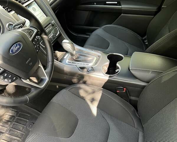 Белый Форд Мондео, объемом двигателя 2 л и пробегом 142 тыс. км за 13500 $, фото 19 на Automoto.ua