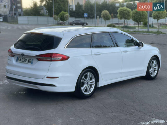 Белый Форд Мондео, объемом двигателя 2 л и пробегом 182 тыс. км за 14200 $, фото 4 на Automoto.ua