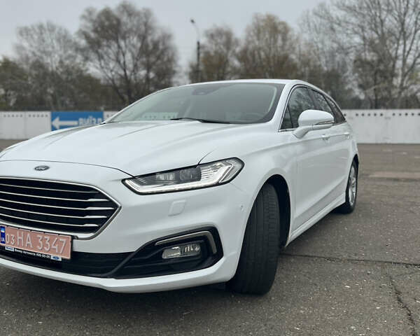 Белый Форд Мондео, объемом двигателя 2 л и пробегом 115 тыс. км за 17499 $, фото 1 на Automoto.ua