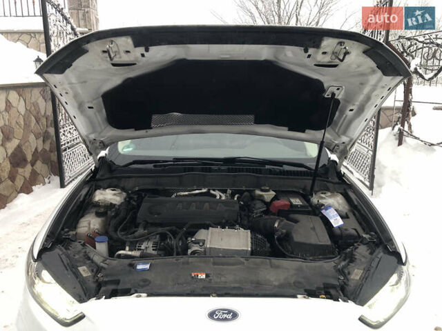 Білий Форд Мондео, об'ємом двигуна 2 л та пробігом 278 тис. км за 13800 $, фото 9 на Automoto.ua