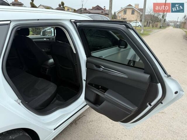 Білий Форд Мондео, об'ємом двигуна 2 л та пробігом 182 тис. км за 18500 $, фото 9 на Automoto.ua