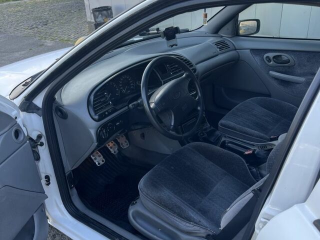 Білий Форд Мондео, об'ємом двигуна 1.6 л та пробігом 318 тис. км за 1700 $, фото 4 на Automoto.ua