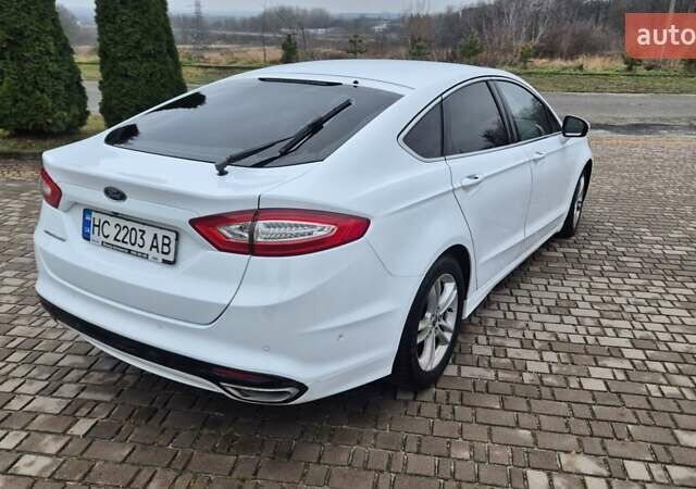 Белый Форд Мондео, объемом двигателя 2 л и пробегом 297 тыс. км за 13900 $, фото 24 на Automoto.ua