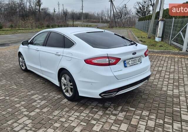 Белый Форд Мондео, объемом двигателя 2 л и пробегом 297 тыс. км за 13900 $, фото 25 на Automoto.ua