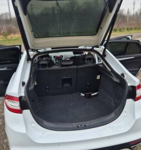 Белый Форд Мондео, объемом двигателя 2 л и пробегом 297 тыс. км за 13900 $, фото 58 на Automoto.ua