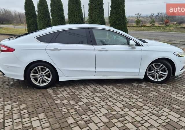 Белый Форд Мондео, объемом двигателя 2 л и пробегом 297 тыс. км за 13900 $, фото 6 на Automoto.ua