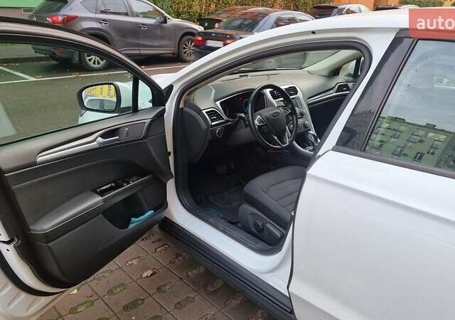 Белый Форд Мондео, объемом двигателя 2 л и пробегом 75 тыс. км за 15000 $, фото 9 на Automoto.ua